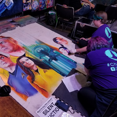 The Archon Dealer’s Room with vendors and attendees.