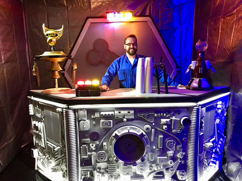 Fans socializing at Archon room parties.