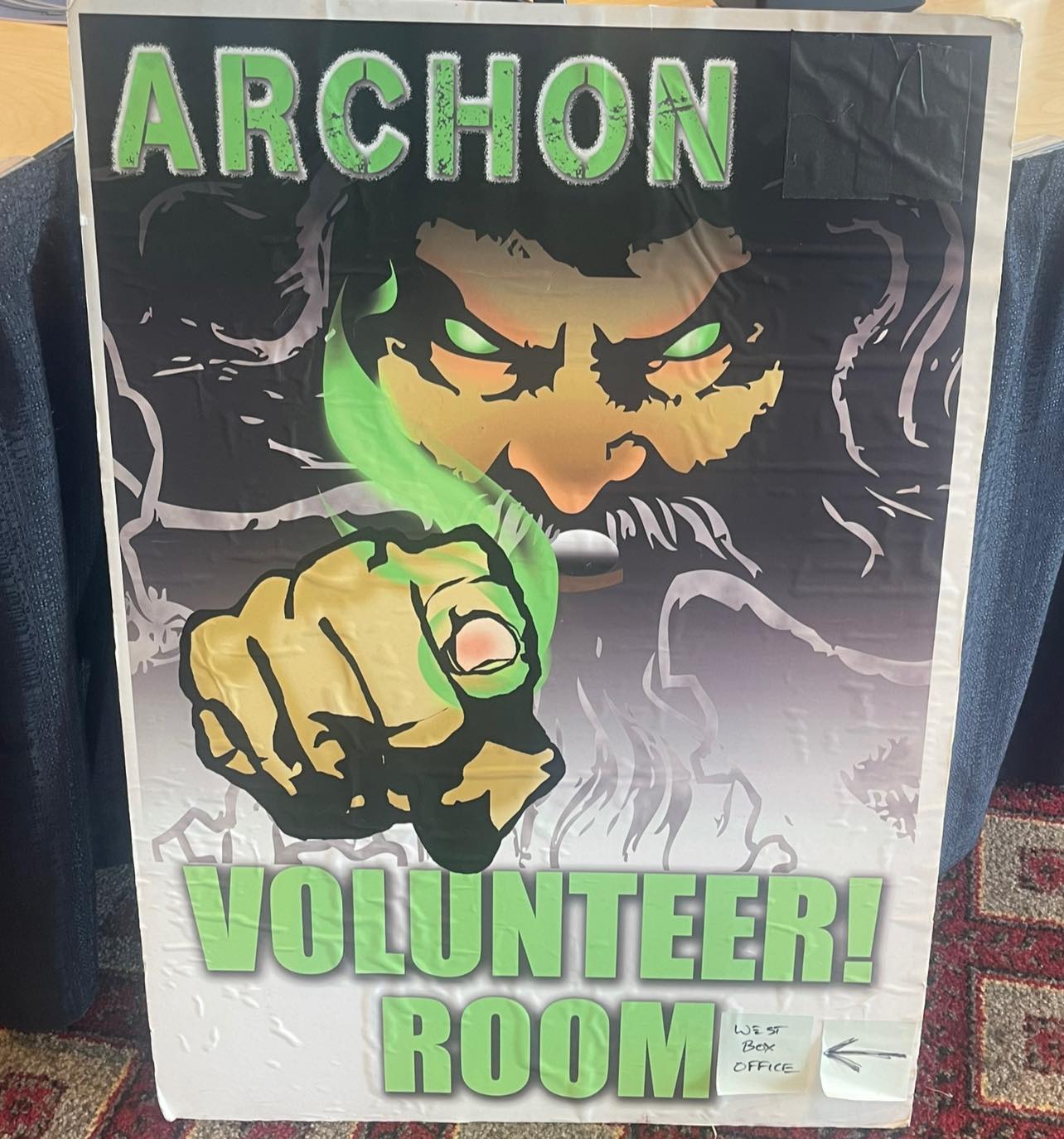 Archon volunteers assisting attendees.